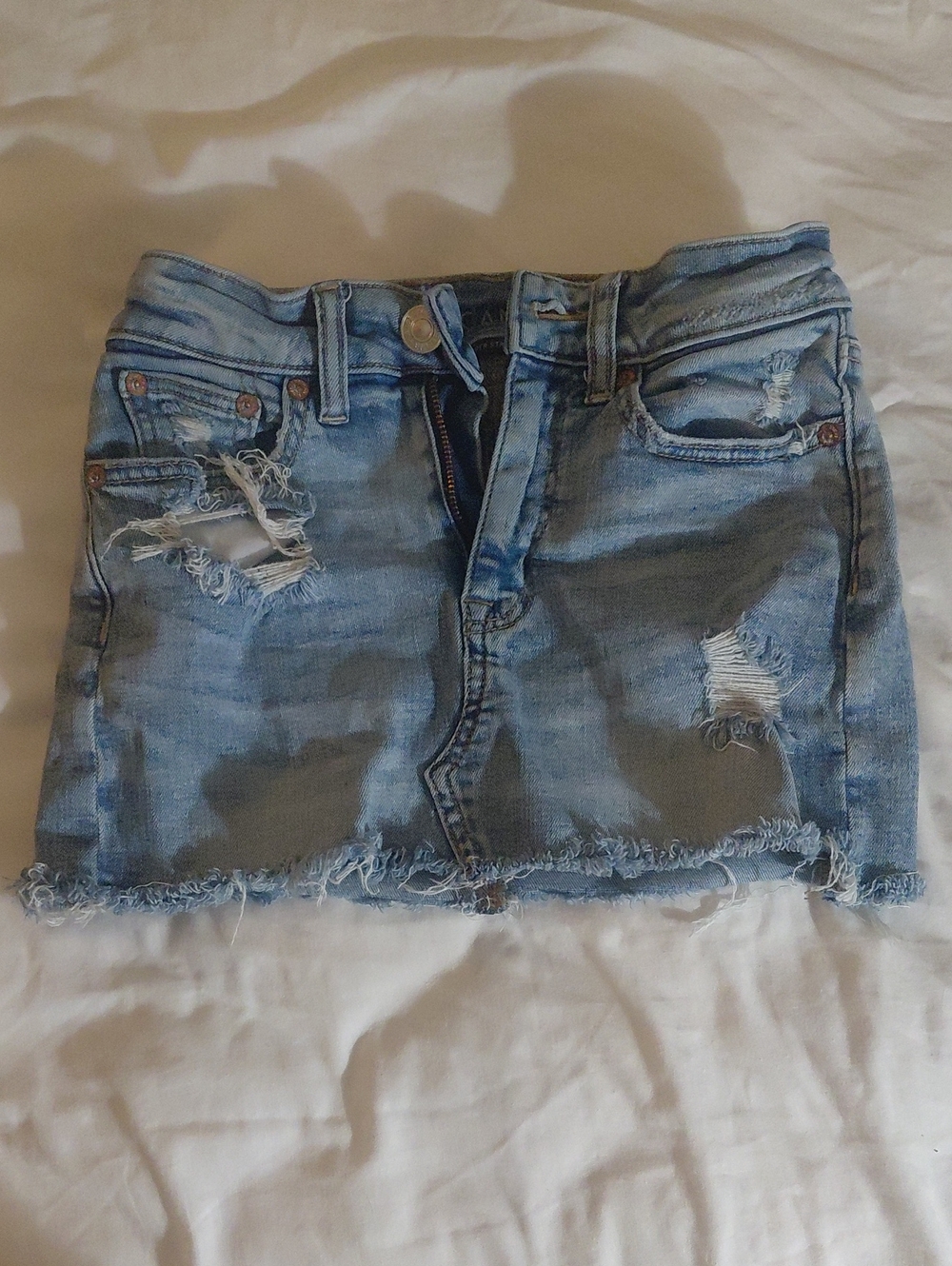 American Eagle Outfitters Light Blue Distressed Denim Mini Skirt